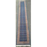 A blue and brown long carpet runner