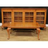 A George II inspired walnut break-centre low library bookcase, 90.5cm high, 185cm wide, 36cm deep; a
