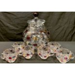 A continental glass hand made and hand painted punch bowl and cover with six conforming cups