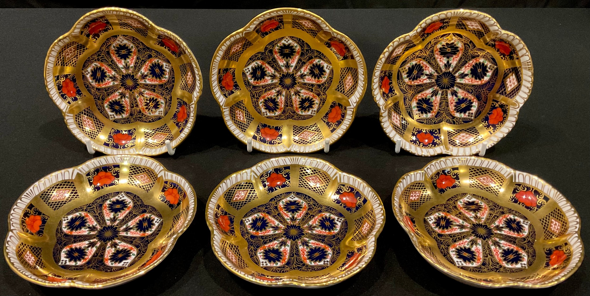 A set of six Royal Crown derby Imari palette 1128 pattern five petal trinket dishes, 11.5cm