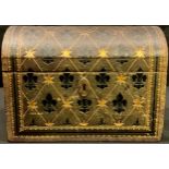 A late 19th century tooled leather domed stationery box, hinged cover, embossed with stars and
