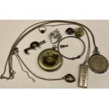 A silver ingot; a Scottish silver Celtic heart brooch; an equestrian brooch; etc (quantity)