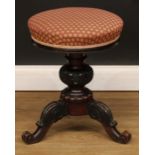 A Victorian height-adjustable piano stool, 49cm raising to 62cm high, the seat 38cm diameter