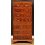 A George III style chest on chest, rectangular top above two short and three long drawers, the