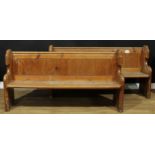 A pair of late 19th/early 20th century pine pews, removed from a French convent chapel in