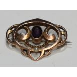 An Art Nouveau 9ct rose gold brooch, by Murrle, Bennett & Co, central set with an amethyst and