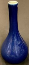 A Chinese blue glazed bottle vase, 15cm high