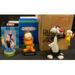 A Warner Brothers Looney Tunes model, Sylvester and Tweety Pie, 24cm, c.2000, boxed; another Popeye,