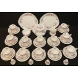 A Royal Albert Lavender Rose pattern tea set, comprising twelve teacups, saucers and tea plates,