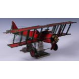 Toys & Juvenalia - a Meccano biplane, possibly a shop display, 26cm high on stand, 65cm wingspan