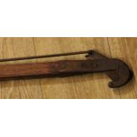 An early 20th century pitch pine tree pruner, 305cm long