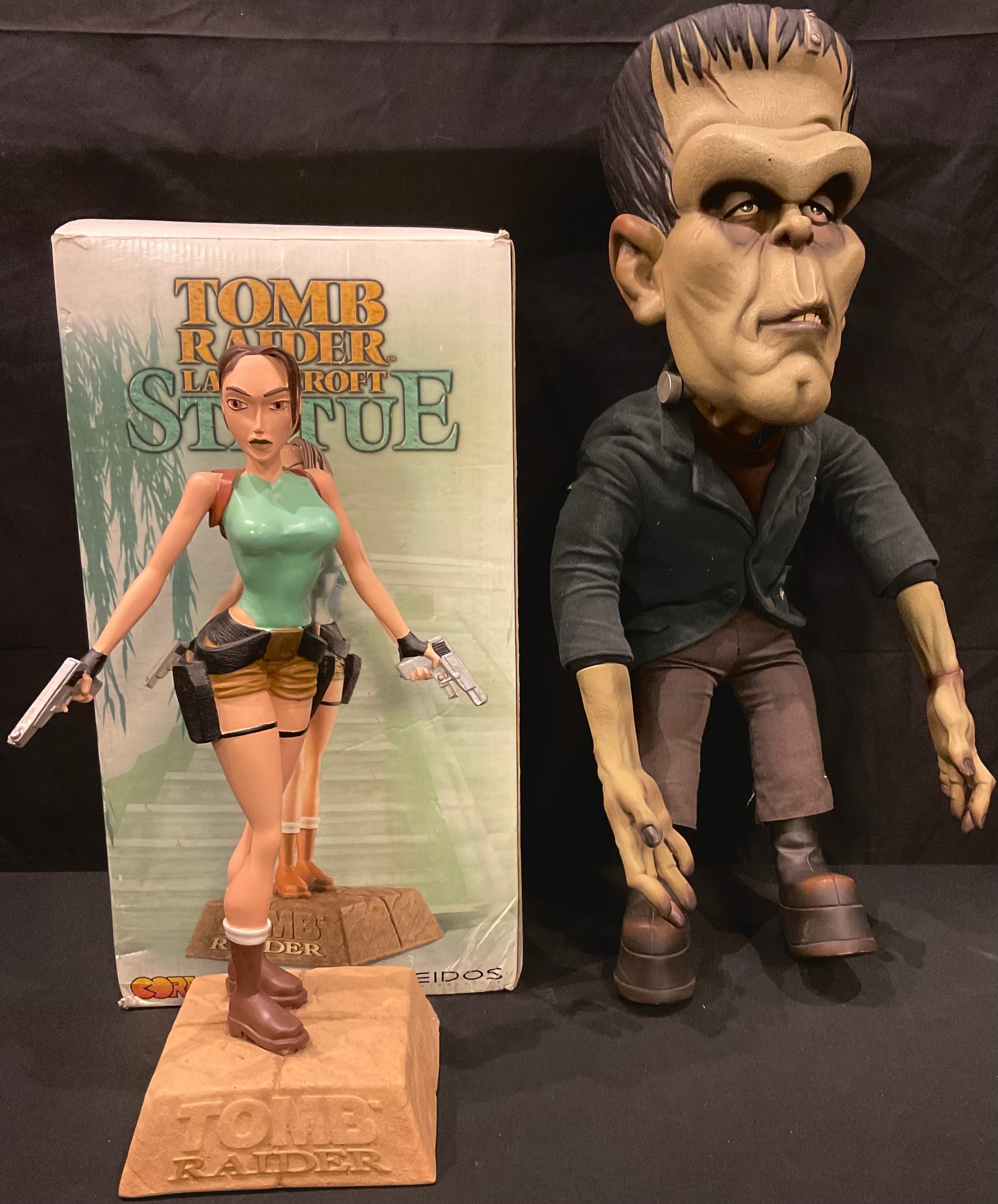 A resin model of Tomb Raider's Lara Croft, 38cm, boxed; a novelty Frankenstein's Monster bendy