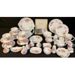 A Royal Crown Derby Posies tea service for six comprising cake plate, cream jug, sugar bowl, knives,