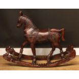 Toys & Juvenalia - a contemporary carved hardwood rocking horse, 77cm high, 101cm long, 32cm wide