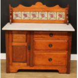 A late Victorian marble top washstand, shaped and tiled gallery, oversailing rectangular top above a