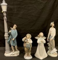 A Lladro figure, The Lamp Lighter, 48cm, printed marks; three others smaller, Don Quixote, Sancho