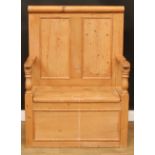 A pine box settle or bench, two panel back, hinged seat, 124.5cm high, 91cm wide, the seat 76cm wide