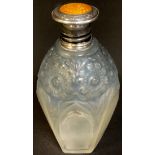 An Art Deco iridescent glass scent bottle, silver and enamel top, 12cm