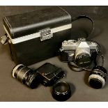A Mamiya/Sekor 100 DTL 35mm camera, auto lens, serial number 55700; another lens, Hanimex l :3.5,