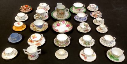 A collection of 19th century and later miniature teacups and saucers, Wedgwood Jasperware, Royal