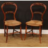 A pair of Victorian balloon back side chairs, rush seats, 85cm high, 38.5cm wide, 32cm deep (2)