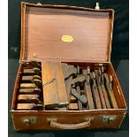 Tools - a collection of sixteen wood planes, in suitcase