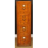 An early 20th century oak filing cabinet, of four drawers, Referee Letter File, trademark no 245569,