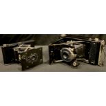 An Eastman Kodak Company Vest Pocket camera, USA Rochester NY, 14406, concertina folding, 12cm wide;