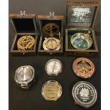 A collection of six reproduction maritime compasses