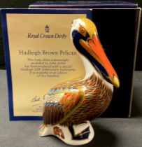 A Royal Crown Derby paperweight, Hadleigh Brown Pelican, 20th anniversary exclusive, gold stopper,