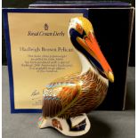 A Royal Crown Derby paperweight, Hadleigh Brown Pelican, 20th anniversary exclusive, gold stopper,