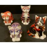A Royal Crown Derby paperweight, Calico Kitten, gold stopper; three others, Sitting Kitten,