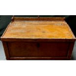 A 19th century Arts and Crafts scumbled pine table top writing box, the gallery carved with
