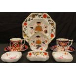 A pair of Royal Crown Derby The Curator's Collection Imari palette coffee cans and saucers, Acanthus