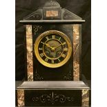 A late 19th century French slate architectural mantel clock, arched case, Roman numerals, twin