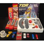 Toys - a TCR racing car set, boxed; with additional track, boxed; assorted Scalextric cars,