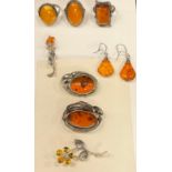 Jewellery - Continental silver mounted amber rings and brooches; others