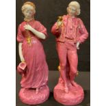 A pair of 19th century Continental porcelain figures of a courting couple, in the manner of