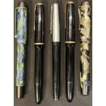 Pens - a Mentmore marbled fountain pen, 14ct gold nib; others, 14ct gold nibs (5)