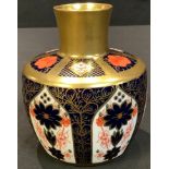 A Royal Crown Derby Imari palette 1128 pattern bottle vase, solid gold band, 10.5cm, printed mark in