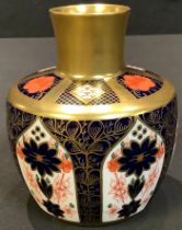 A Royal Crown Derby Imari palette 1128 pattern bottle vase, solid gold band, 10.5cm, printed mark in