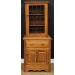 Christopher Milner, Fine Woodcraft of Alfreton - an oak display or bookcase cabinet, moulded cornice