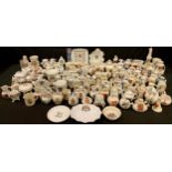 A collection of Carlton China Lucky White Heather souvenir ware and crested china, Goss, etc,