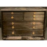 A collector's/tool cabinet, an arrangement of five small over three graduated long drawers, 32cm x