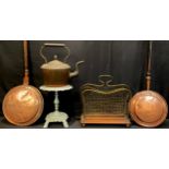 An George III copper warming pan, wriggle-work cover; another; a Victorian copper kettle; a cast