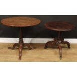 A George III oak tripod occasional table, 67cm high, 76cm diameter; a Regency mahogany low tripod