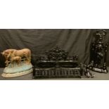 A Wright foundry painted cast iron door stop, horse and foal, 25cm high; a cast metal double dog
