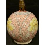 A Bursley ware Charlotte Rhead tube lined spherical vase, decorated with yellow flower heads on a