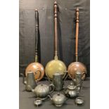 A 19th century copper and brass warming pan; others; 19th century pewter tea pots, coffee pots, etc,