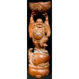 A Chinese hardwood carving, Laughing Buddha, 67.5cm high